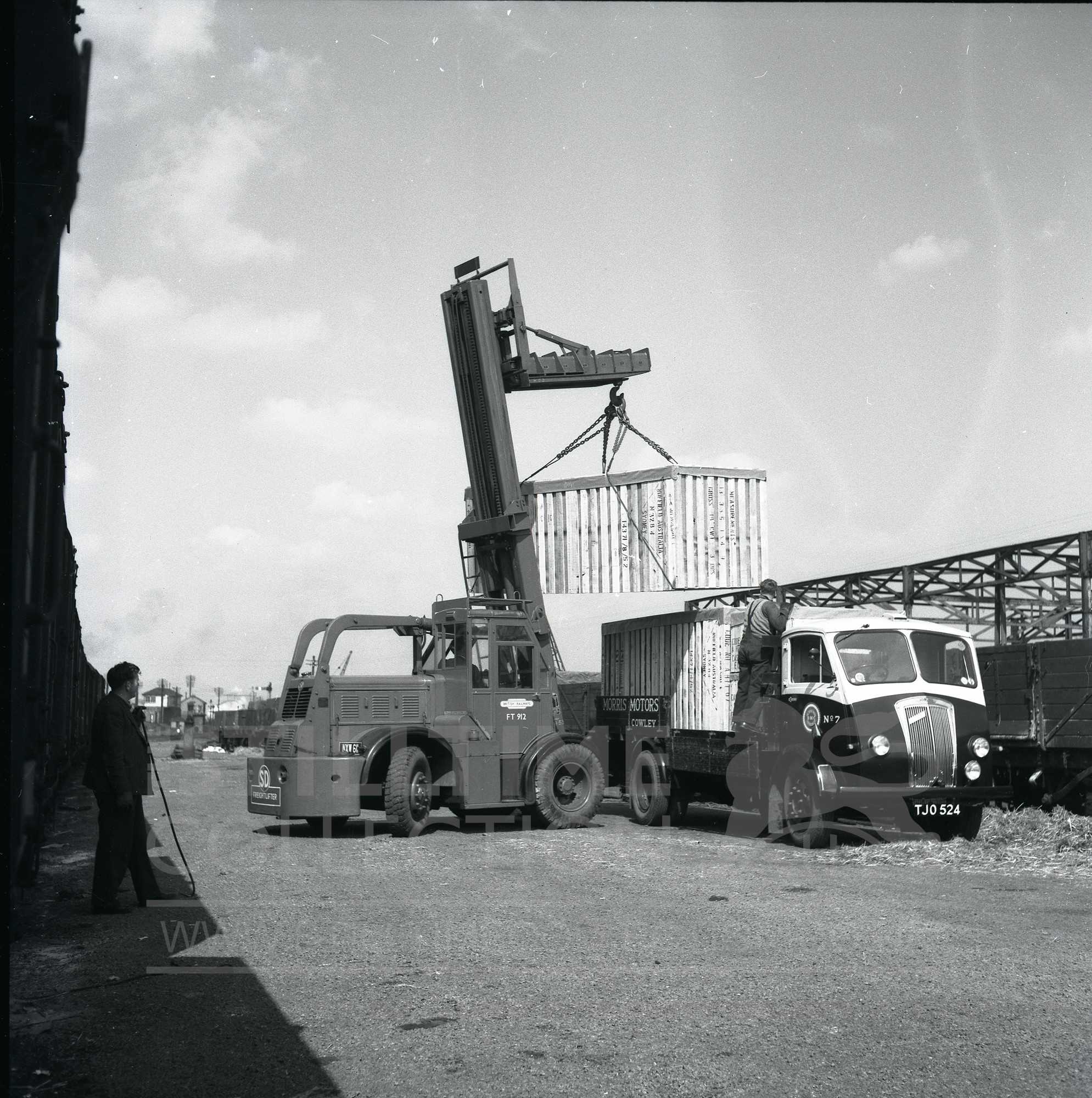 fork lifts mhe at british railways rail train station yard oxford | The ...